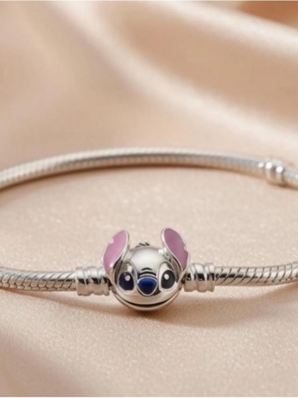 Silver Stitch Charm Bracelet –...